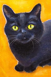 黄色の背景に描かれた黒猫の油絵風イラスト