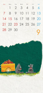 9月のカレンダーとリンゴを手にしたクマのイラスト